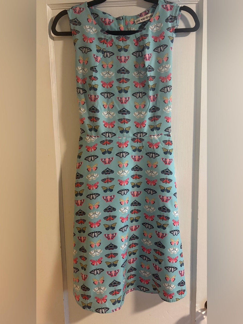 Sleeveless Light Blue Butterfly Print Midi Dress with Pockets and Tie in Back